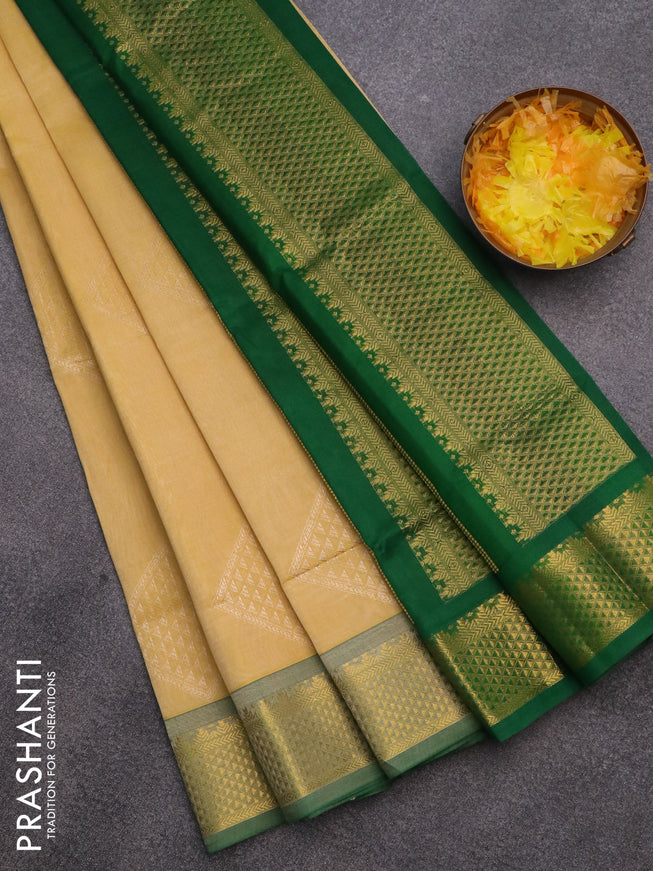 Silk cotton saree yellow and green with allover self emboss & jacquard and zari woven border