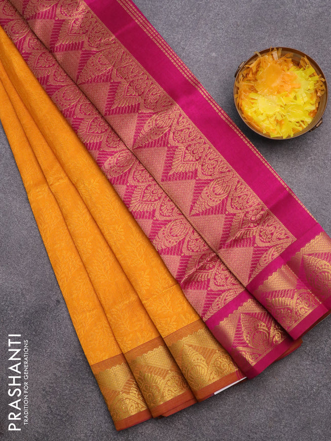 Silk cotton saree mango yellow and magenta pink with allover self emboss & jacquard and zari woven border