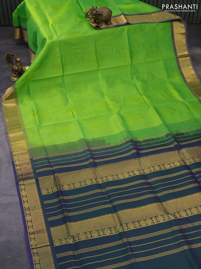 Silk cotton saree light green and dual shade of violet with allover self emboss & jacquard and zari woven border