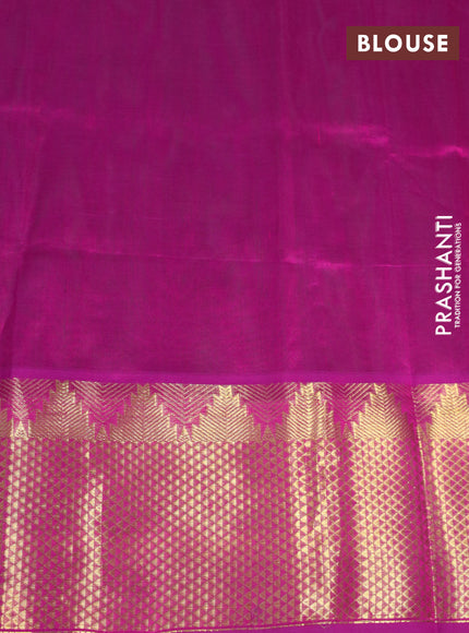 Silk cotton saree dual shade of greenish purple and purple with zari woven buttas and long zari woven border