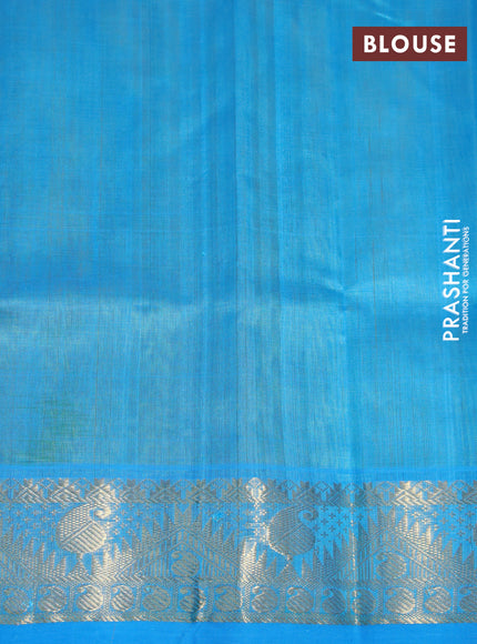 Silk cotton saree flourescent green and cs blue with zari woven buttas and rich zari woven border