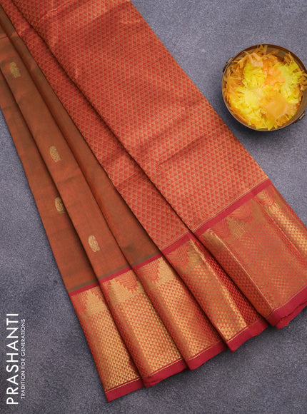 Silk cotton saree dual shade of rustic green and rustic orange with paisley zari woven buttas and long zari woven border