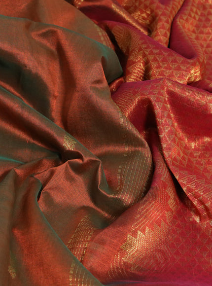 Silk cotton saree dual shade of rustic green and rustic orange with paisley zari woven buttas and long zari woven border