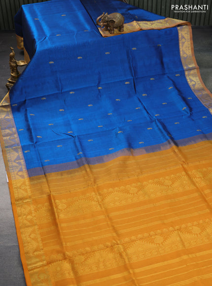 Silk cotton saree peacock blue and mustard yellow with paisley zari woven buttas and rich zari woven border