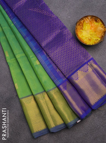 Silk cotton saree dual shade of green and blue with paisley zari woven buttas and long zari woven border