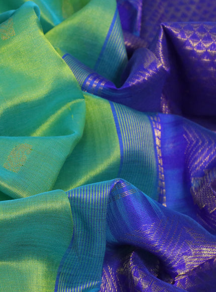 Silk cotton saree dual shade of green and blue with paisley zari woven buttas and long zari woven border