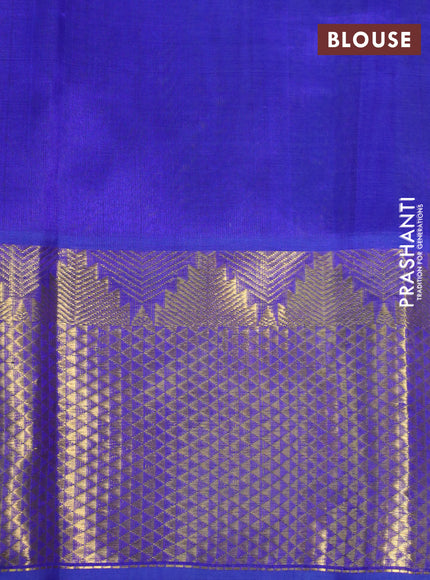 Silk cotton saree dual shade of green and blue with paisley zari woven buttas and long zari woven border