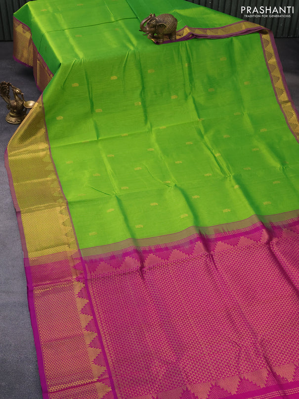 Silk cotton saree light green and purple with zari woven buttas and zari woven border