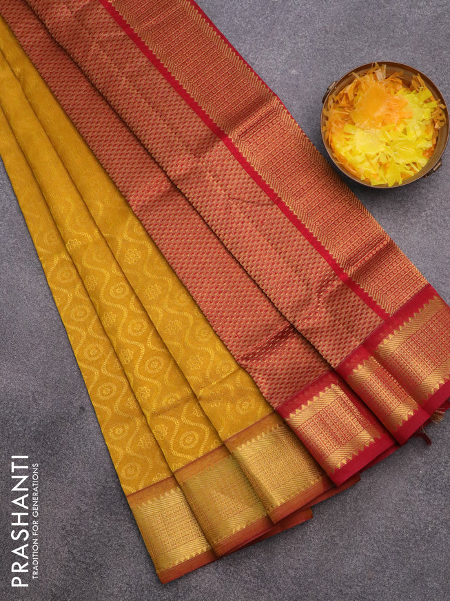 Silk cotton saree mustard yellow and maroon with allover self emboss & jacquard and zari woven border