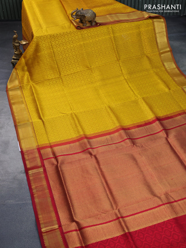 Silk cotton saree mustard yellow and maroon with allover self emboss & jacquard and zari woven border