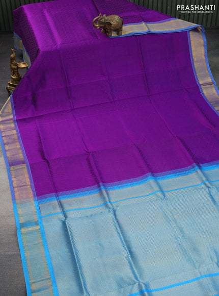 Silk cotton saree violet shade and cs blue with allover self emboss & jacquard and zari woven border