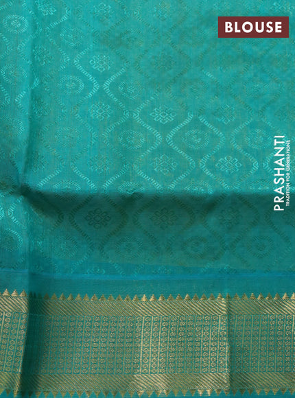 Silk cotton saree mustard yellow and teal green shade with allover self emboss & jacquard and zari woven border