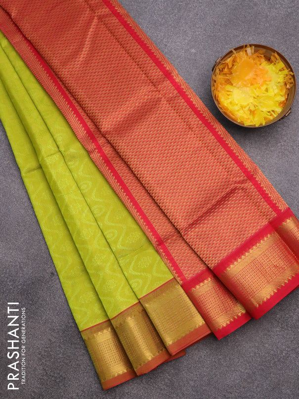 Silk cotton saree flourescent green and red with allover self emboss & jacquard and zari woven border