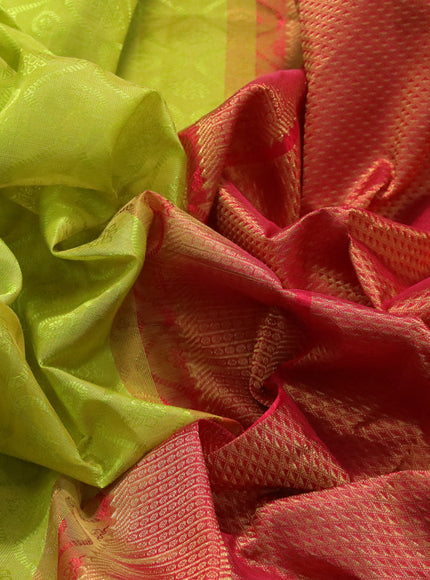 Silk cotton saree flourescent green and red with allover self emboss & jacquard and zari woven border