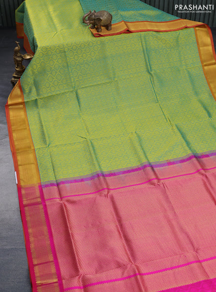 Silk cotton saree dual shade of teal bluish green and pink with allover self emboss & jacquard and zari woven border