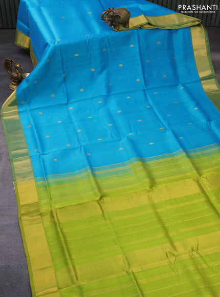 Silk cotton saree teal blue and light green with zari woven buttas and zari woven border