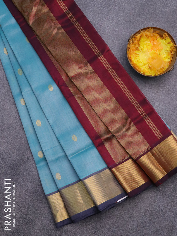 Silk cotton saree light blue and maroon with zari woven buttas and zari woven border