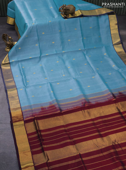 Silk cotton saree light blue and maroon with zari woven buttas and zari woven border