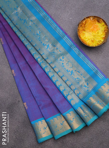 Silk cotton saree dual shade of bluish maroon and cs blue with zari woven buttas and annam zari woven border