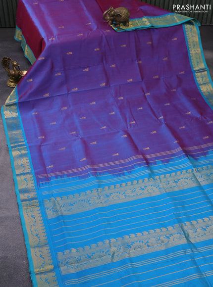 Silk cotton saree dual shade of bluish maroon and cs blue with zari woven buttas and annam zari woven border