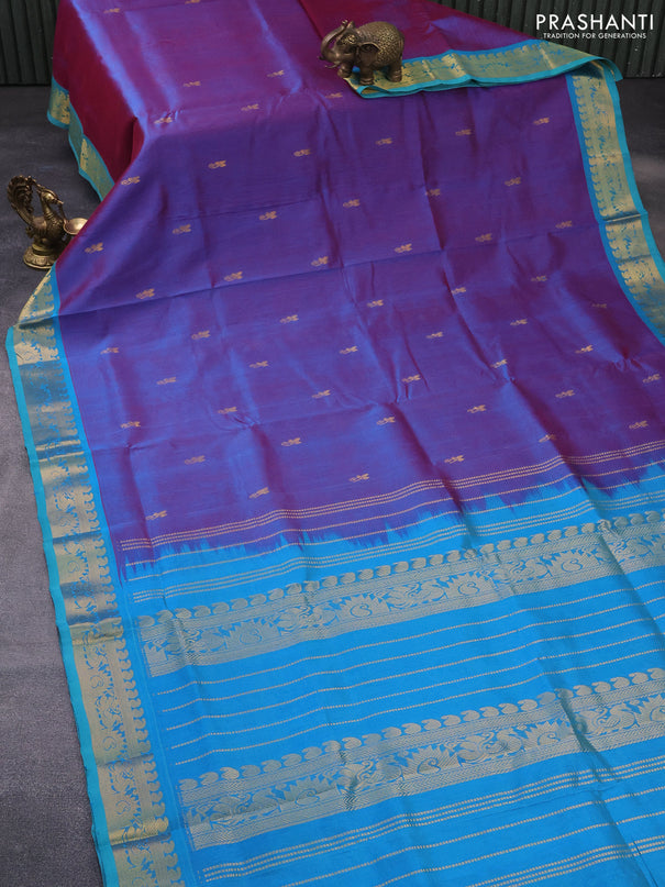 Silk cotton saree dual shade of bluish maroon and cs blue with zari woven buttas and annam zari woven border