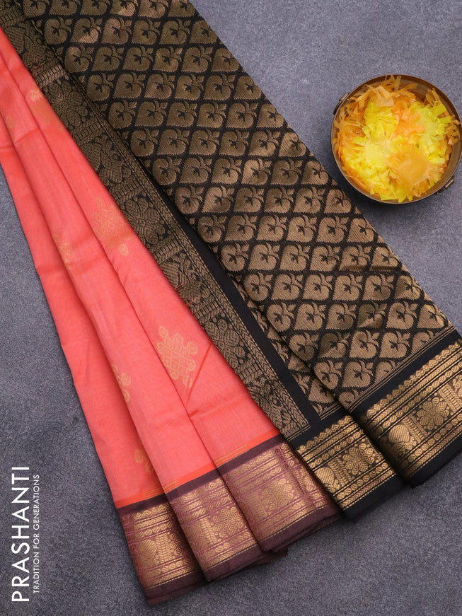 Silk cotton saree peach orange and black with zari woven buttas and annam zari woven border