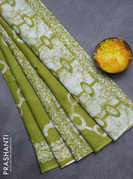 Jaipur cotton saree lime green and off white with allover batik prints and printed border