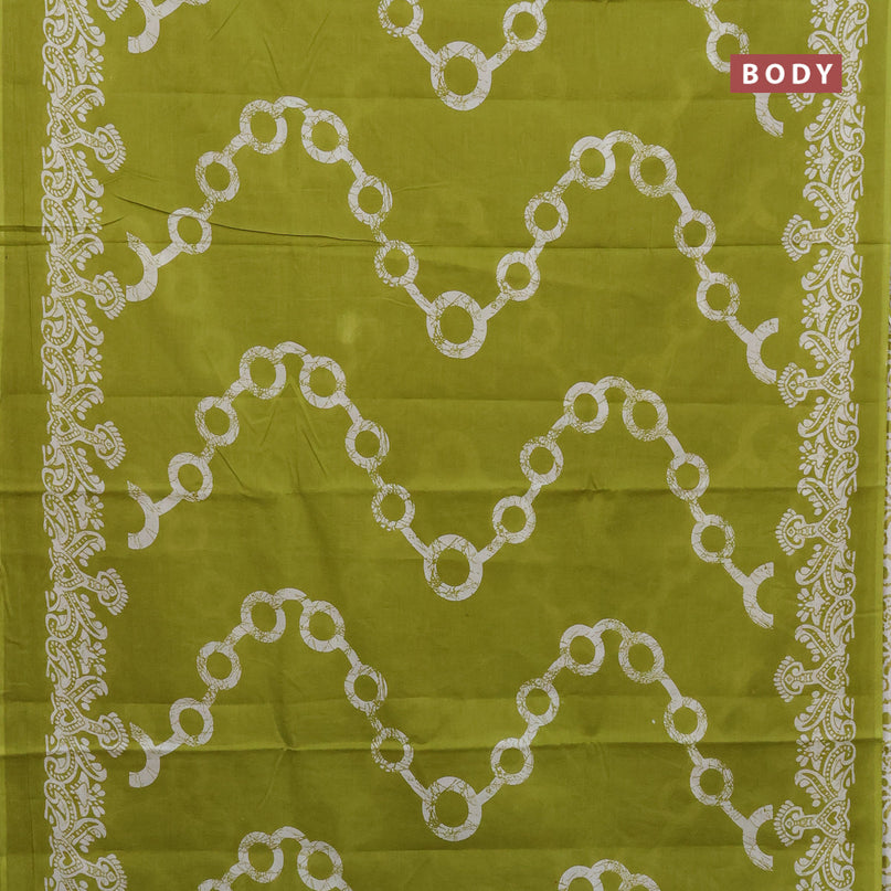 Jaipur cotton saree lime green and off white with allover batik prints and printed border