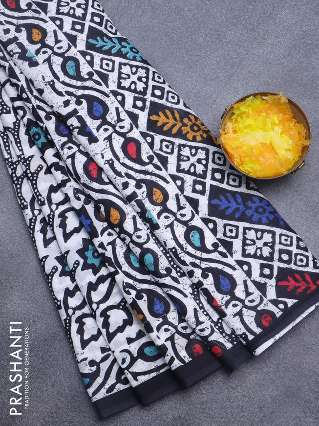 Jaipur cotton saree black and off white with allover batik prints and simple border