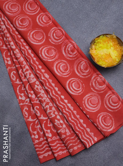 Jaipur cotton saree orange with allover batik prints and printed border