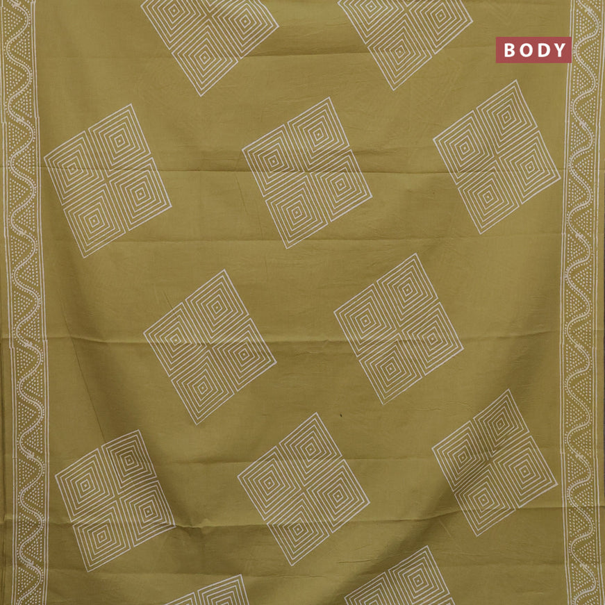 Jaipur cotton saree pista green with geometric prints and printed border