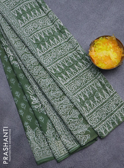 Jaipur cotton saree sap green with allover dabu prints and printed border