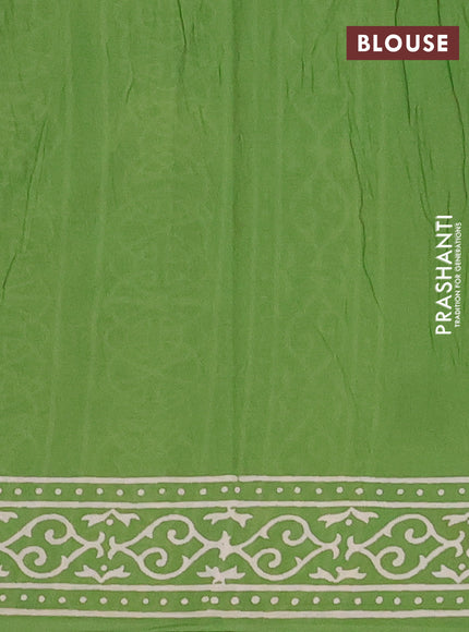 Jaipur cotton saree light green with butta prints and printed border