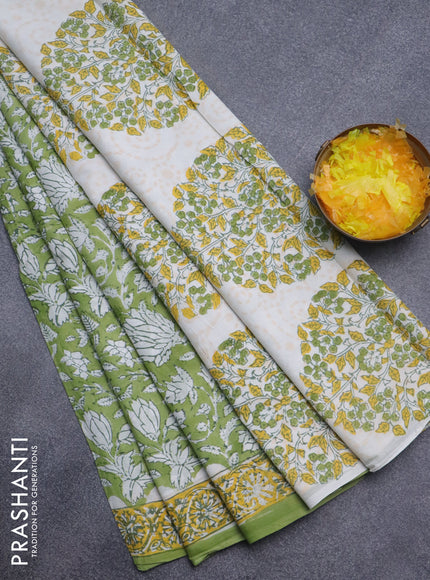 Jaipur cotton saree light green with allover prints and printed border