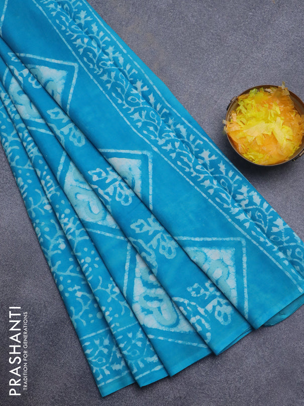 Jaipur cotton saree light blue with allover batik prints and printed border