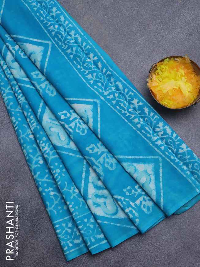 Jaipur cotton saree light blue with allover batik prints and printed border