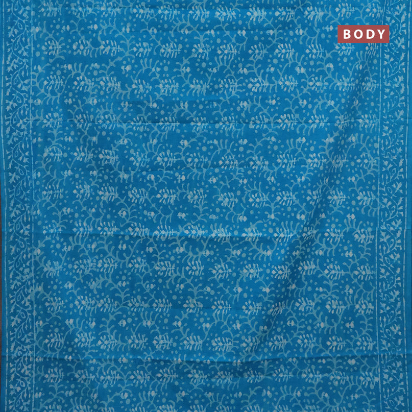 Jaipur cotton saree light blue with allover batik prints and printed border