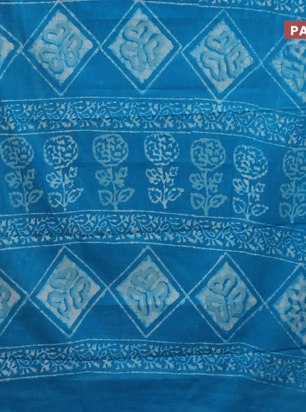 Jaipur cotton saree light blue with allover batik prints and printed border