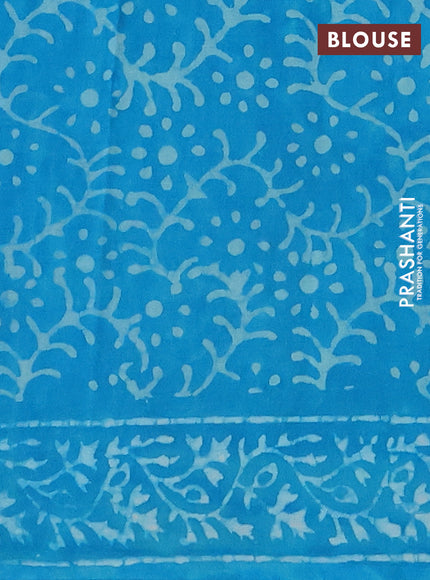 Jaipur cotton saree light blue with allover batik prints and printed border