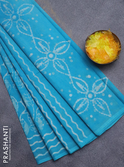 Jaipur cotton saree light blue with allover batik prints and printed border