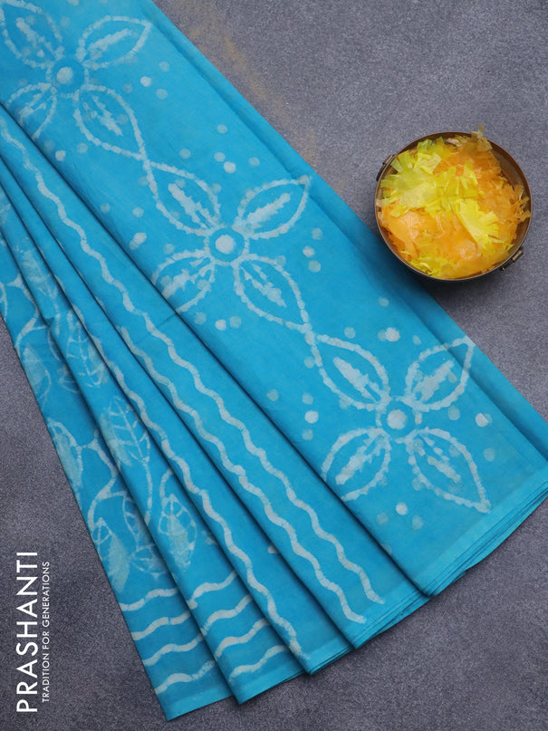 Jaipur cotton saree light blue with allover batik prints and printed border