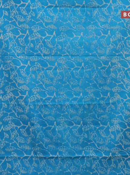 Jaipur cotton saree light blue with allover batik prints and printed border