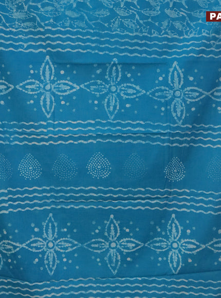 Jaipur cotton saree light blue with allover batik prints and printed border