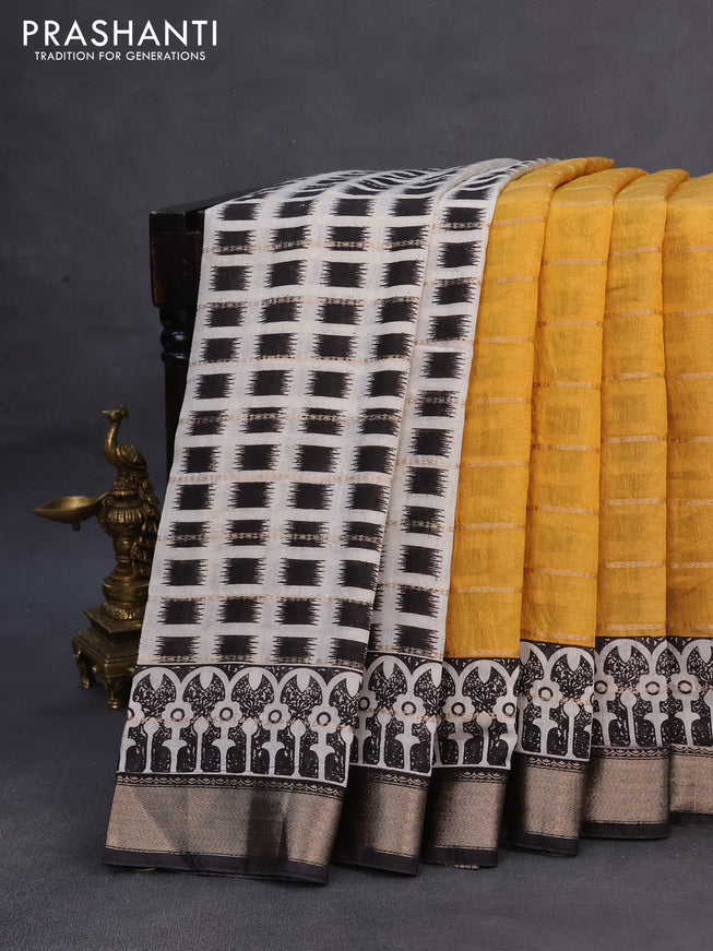 Assam partly silk saree mustard yellow and black with allover prints & zari weaves and zari woven border