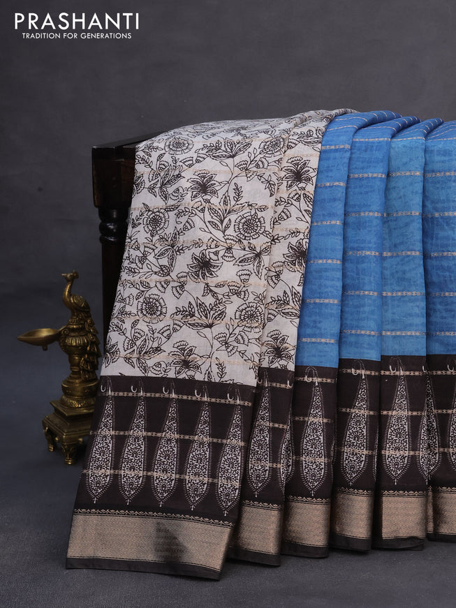 Assam partly silk saree blue and black with allover digital prints & zari weaves and zari woven border