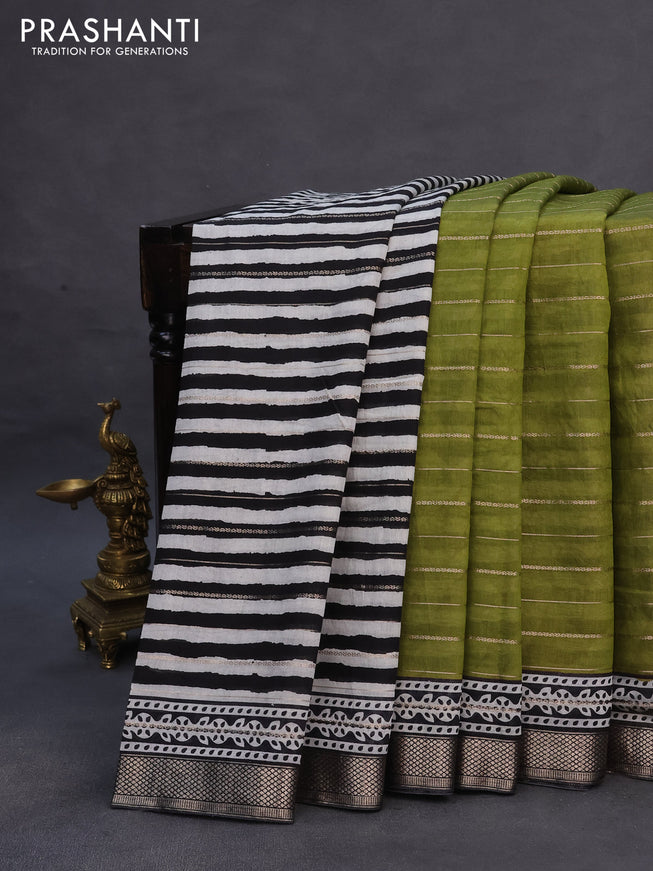 Assam partly silk saree mehendi green and black with digital prints & zari weaves and zari woven border