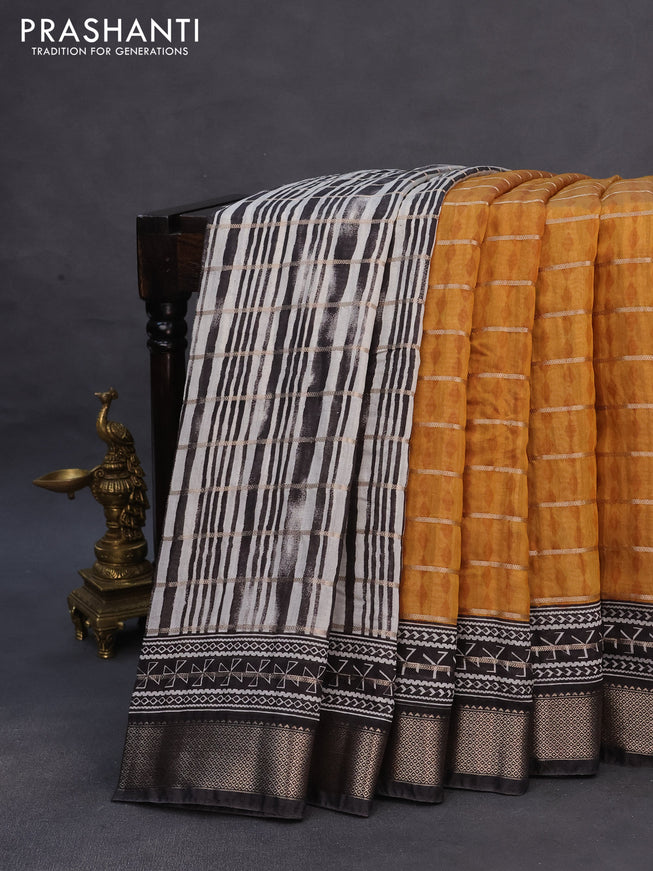 Assam partly silk saree mustard yellow and black with digital prints & zari weaves and zari woven border