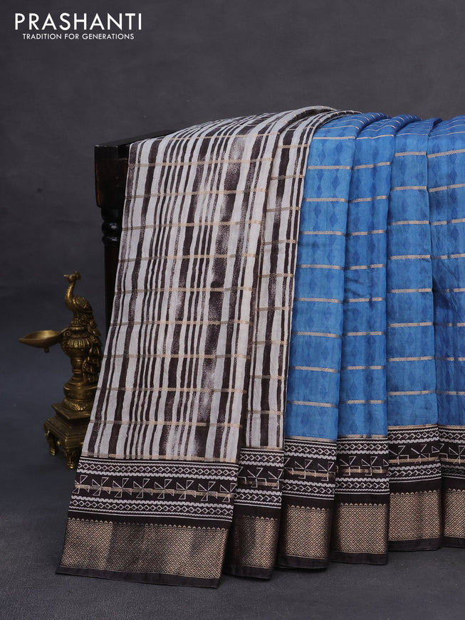 Assam partly silk saree blue and black with digital prints & zari weaves and zari woven border