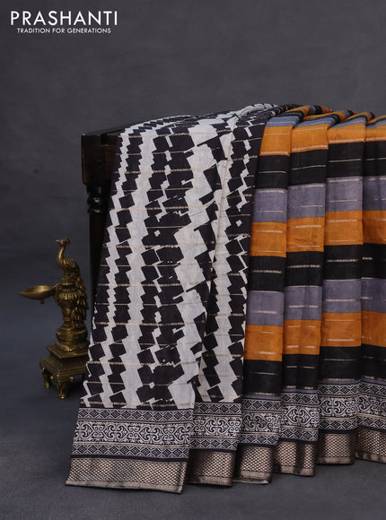 Assam partly silk saree multi colour and mustard black with allover prints & zari weaves and zari woven border