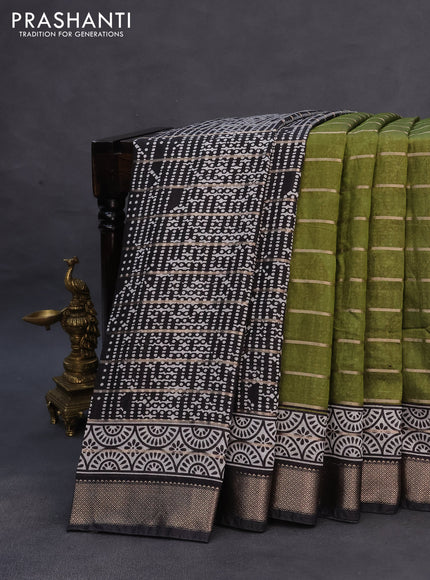 Assam partly silk saree mehendi green and black with digital prints & zari weaves and zari woven border